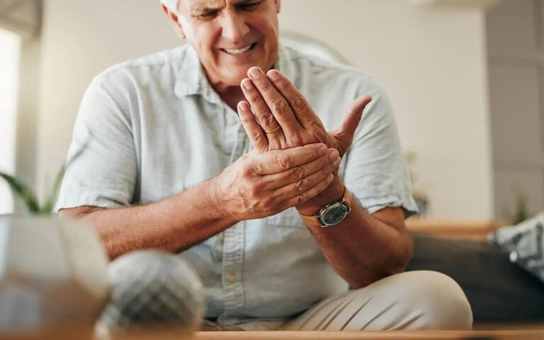 senior-man-hands-and-wrist-joint